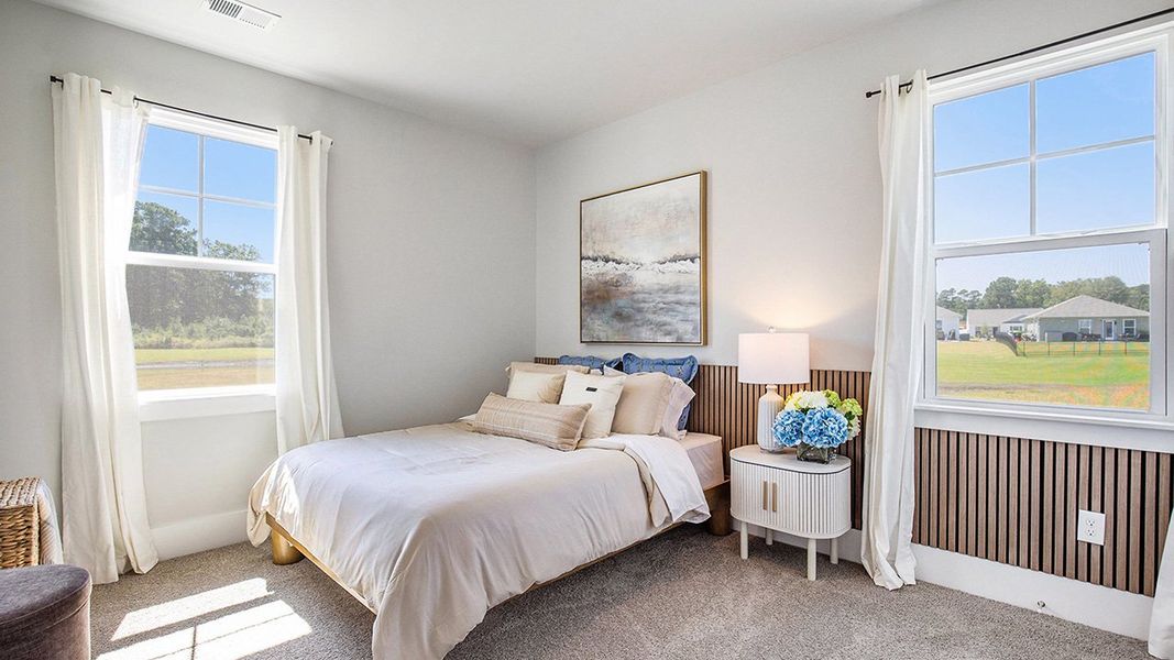Representative furnished interior of a home built from the HARBOR OAK by D.R. Horton in The Forest at Black Bear, Longs (Image 17).