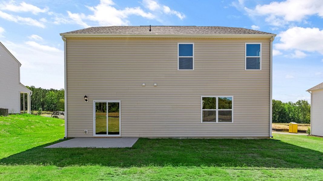 Exterior details and patio area of a home in East Ridge, Ayden (Image 22).