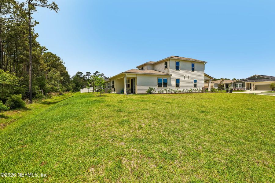 Exterior details and patio area of a home in Seasons at Morada, St. Augustine (Image 4).