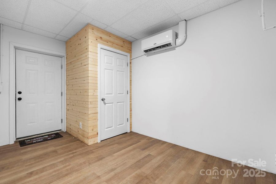 Bedroom with closet and outside entrance