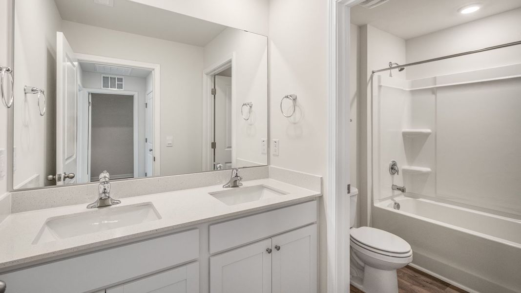 Furnished interior view inside a new home in Faircrest, Greensboro (Image 8). Furnished interior view inside a new home in Faircrest, Greensboro (Image 8).