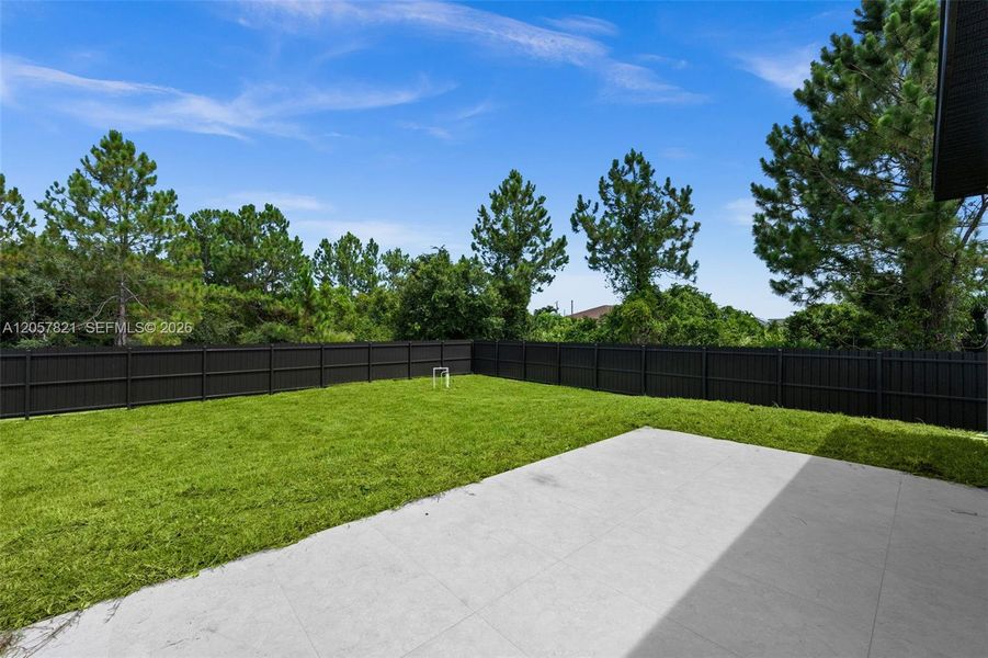 Exterior details and patio area of a home in , Lehigh Acres (Image 4). Exterior details and patio area of a home in , Lehigh Acres (Image 4).