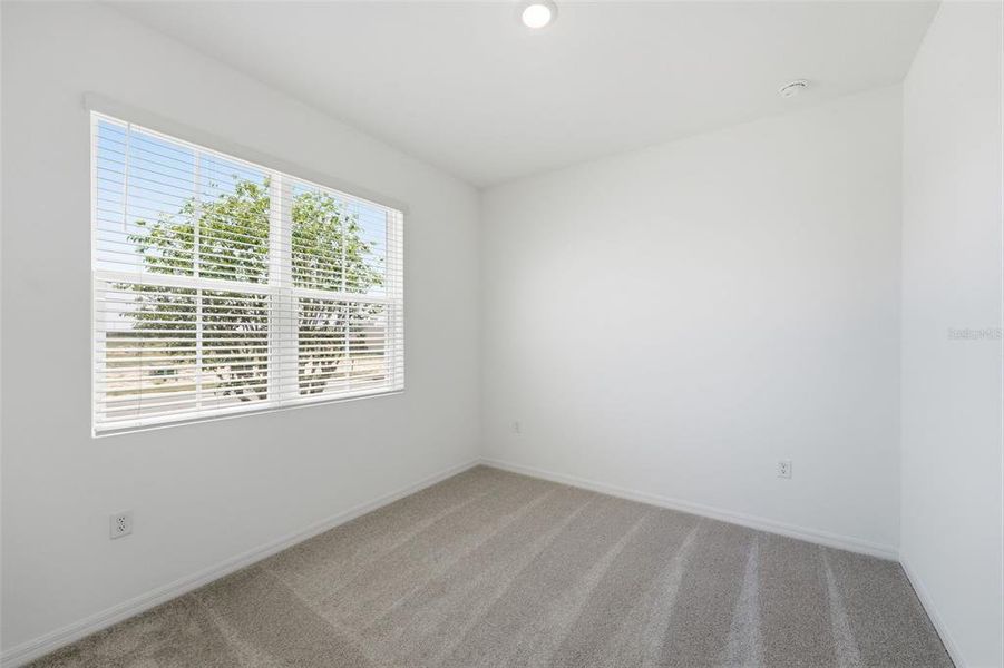Spacious, unfurnished interior of a new home in Hodges Reserve, Howey-in-the-Hills (Image 21).