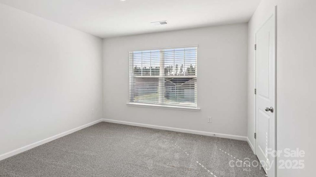 Spacious, unfurnished interior of a new home in Wallace Springs, Statesville (Image 22).