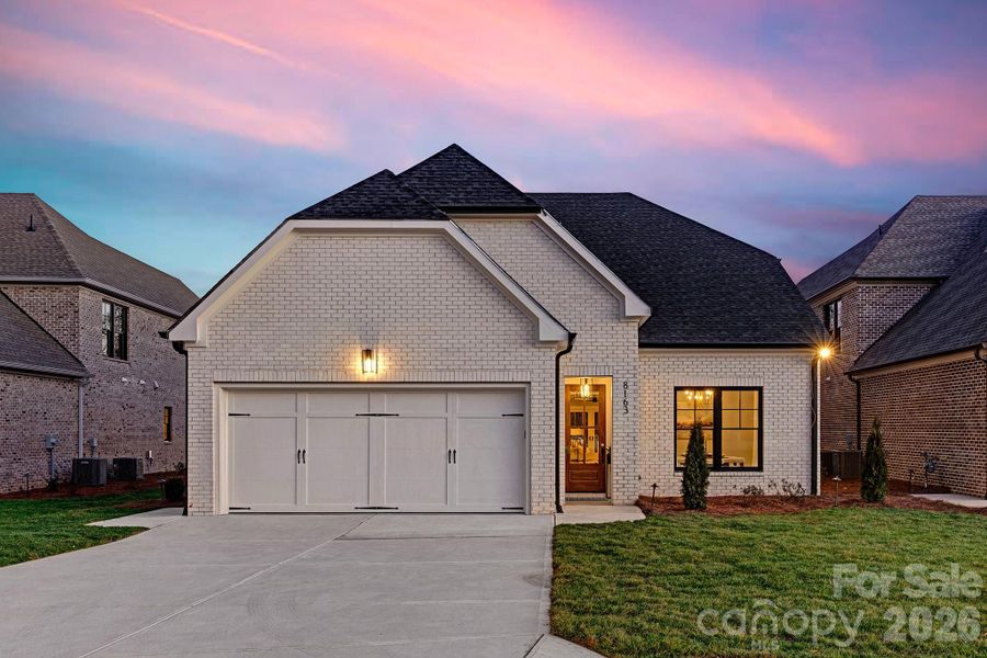 Front exterior of a new home in , Charlotte, NC, highlighting curb appeal (Image 26).