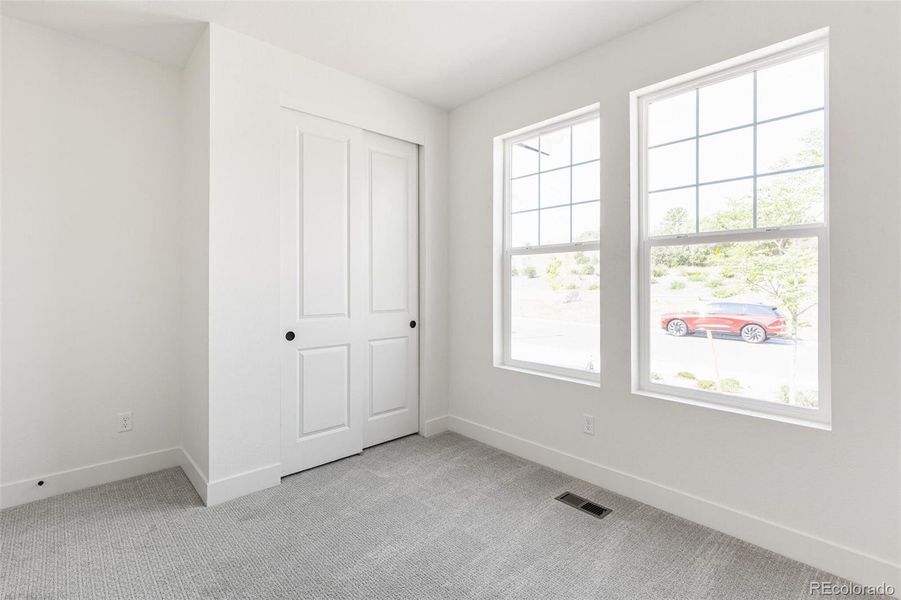 Spacious, unfurnished interior of a new home in Terrain Oak Valley, Castle Rock (Image 23).