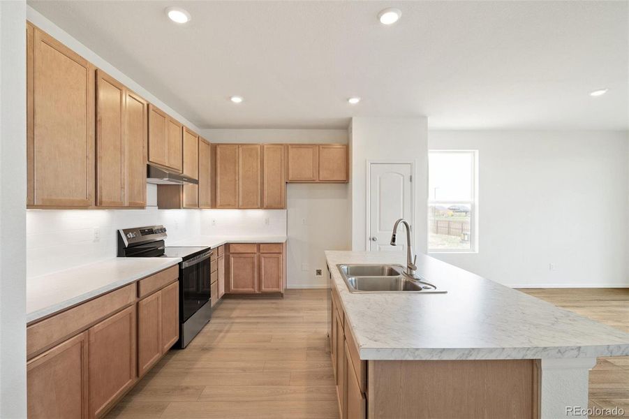 Furnished interior view inside a new home in Turnberry, Commerce City (Image 11).