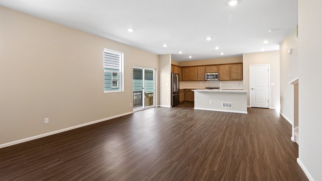 Spacious, unfurnished interior of a new home in Woodrose at Painted Prairie, Aurora (Image 9).
