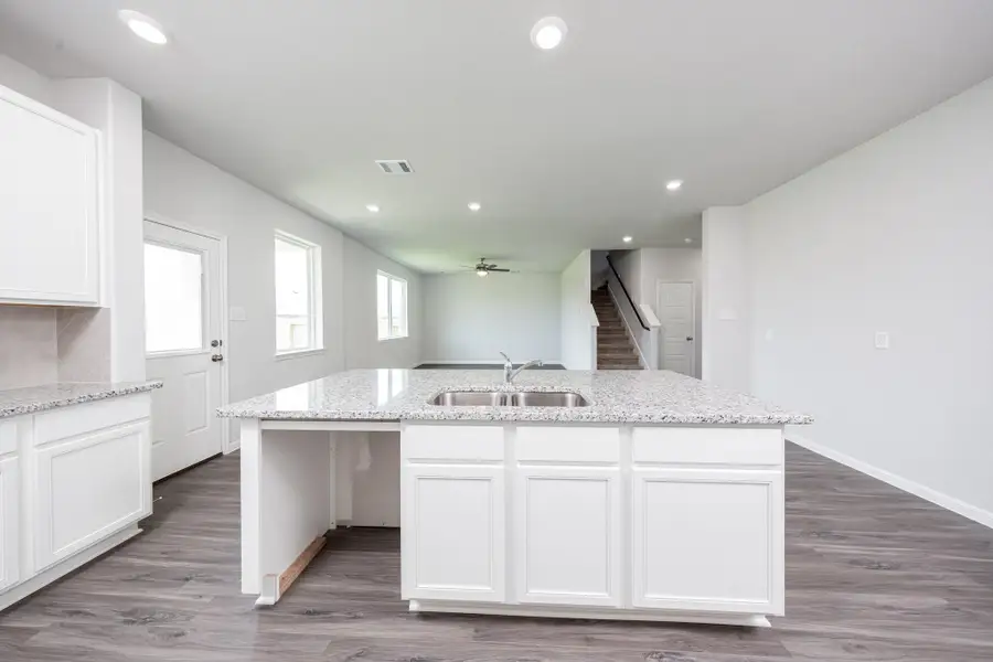 Furnished interior view inside a new home in Granger Pines, Conroe (Image 6).