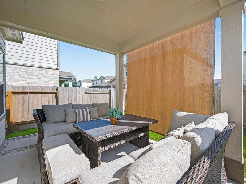 Exterior details and patio area of a home in Lakes at Black Oak, Magnolia (Image 26). Exterior details and patio area of a home in Lakes at Black Oak, Magnolia (Image 26).