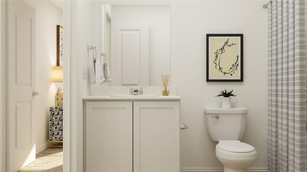 Bathroom with vanity and toilet