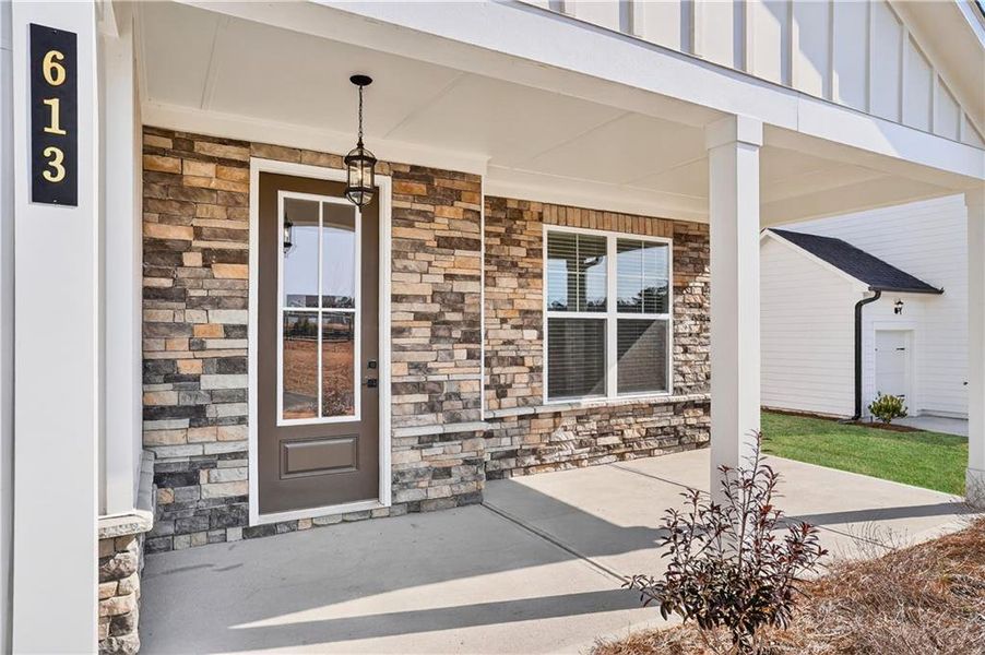 Exterior details and patio area of a home in The Fairways at Mirror Lake, Villa Rica (Image 4).