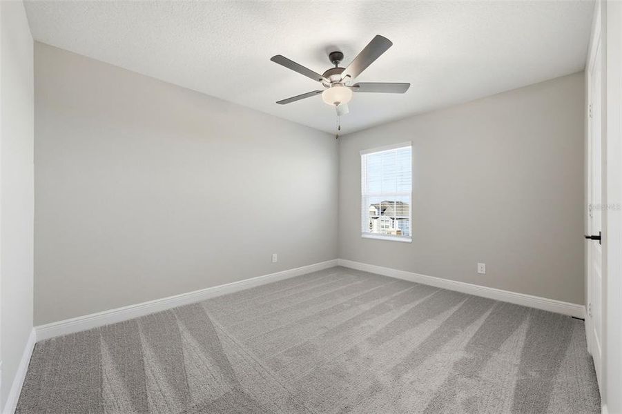 Spacious, unfurnished interior of a new home in Gum Lake Preserve, Lake Alfred (Image 22).