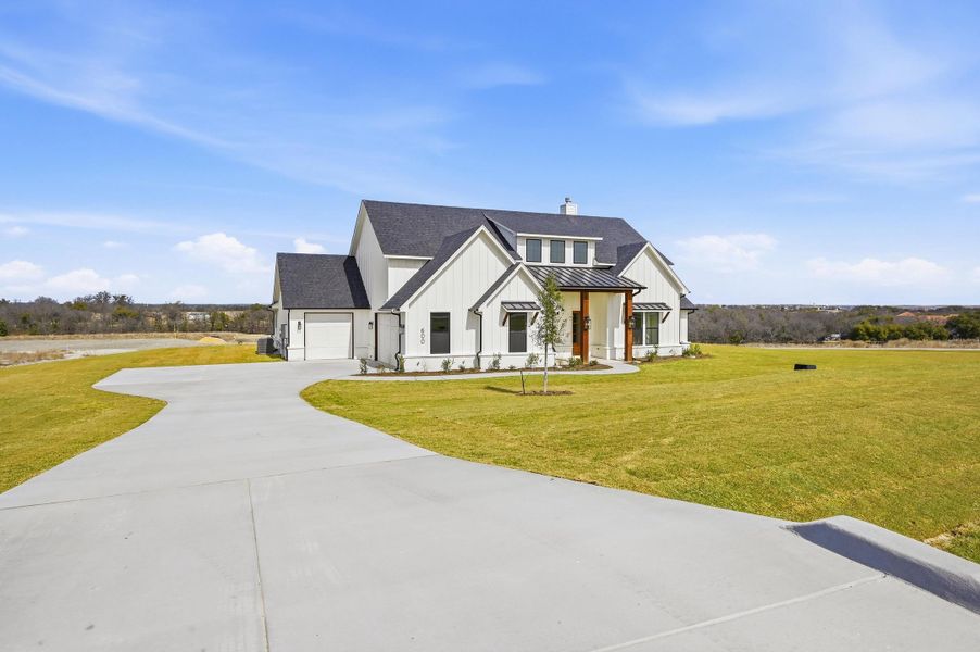 Front exterior of a new home in Aledo Heights - Aledo ISD, Annetta, TX, highlighting curb appeal (Image 2).