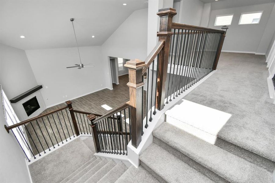 A look from above at the heart of the home. Sample photo of completed home with similar floor plan. As-built interior colors and selections may vary.