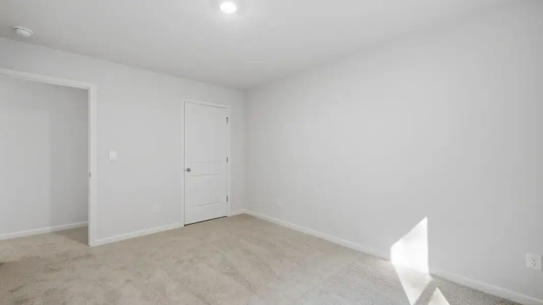 Representative unfurnished interior of a home built from the Green by D.R. Horton in Aurora Creek, Dallas (Image 29).