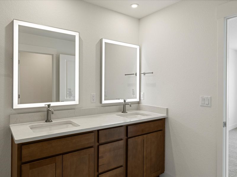 Furnished interior view inside a new home in Ascent at Inverness, Englewood (Image 10).