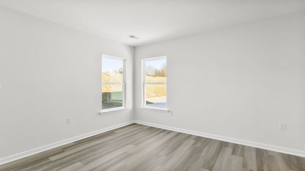 Spacious, unfurnished interior of a new home in Village Grove, Greenville (Image 23).