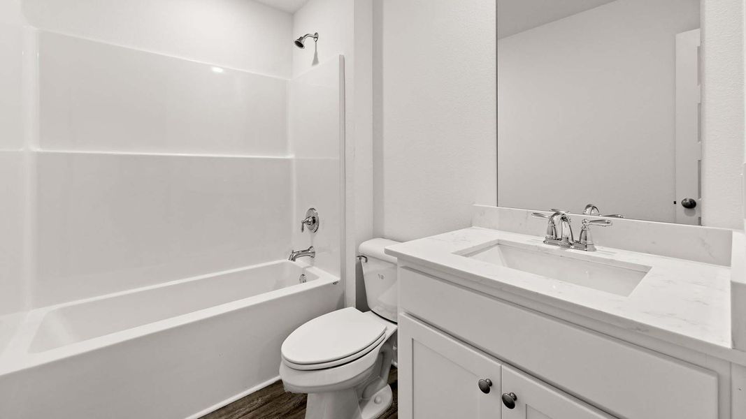 Furnished interior view inside a new home in Magnolia at the Bluffs Phase 3, Freeport (Image 9).