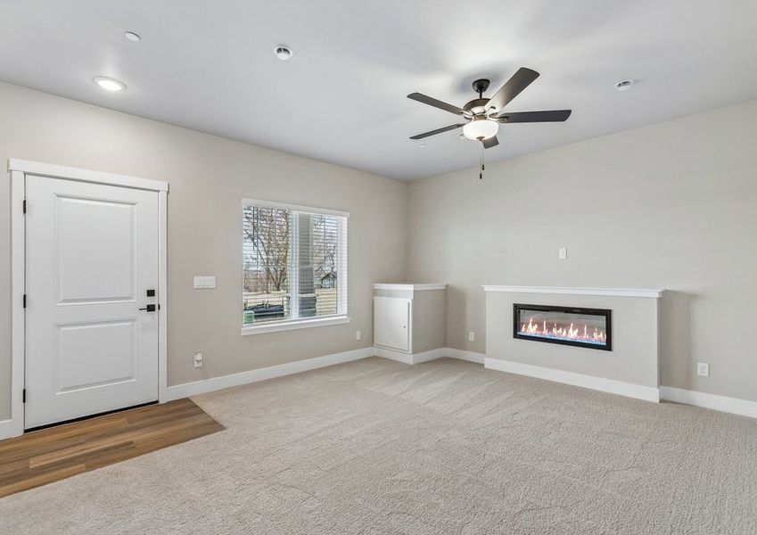 The first floor has a family room with a fireplace.