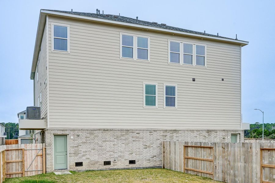 Exterior details and patio area of a home in Townsen Landing, Humble (Image 24). Exterior details and patio area of a home in Townsen Landing, Humble (Image 24).