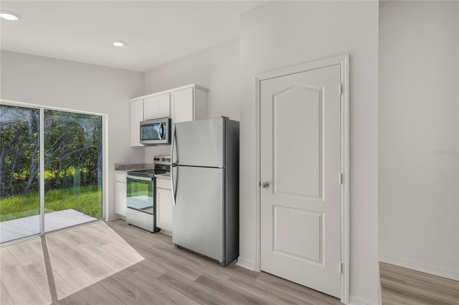 Furnished interior view inside a new home in Poinciana, Poinciana (Image 4).