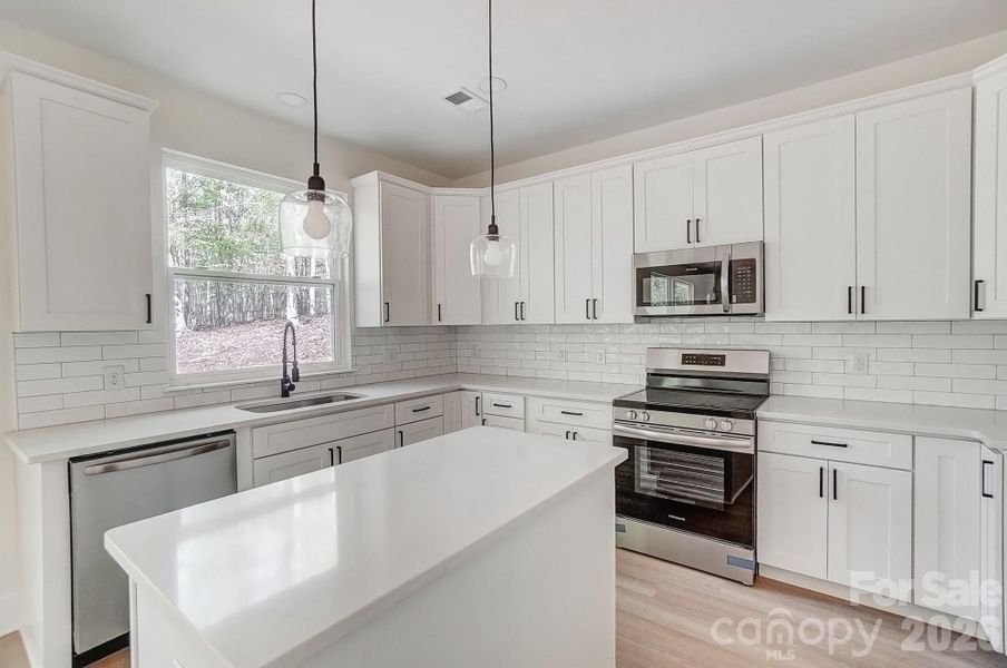 Furnished interior view inside a new home in , Statesville (Image 3).