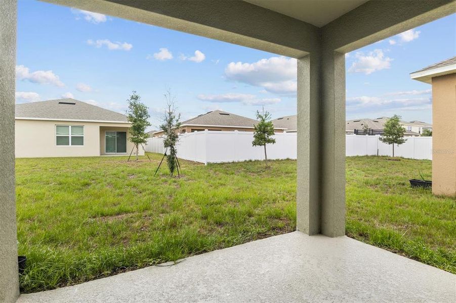 Exterior details and patio area of a home in Cypress Park Estates, Haines City (Image 26).