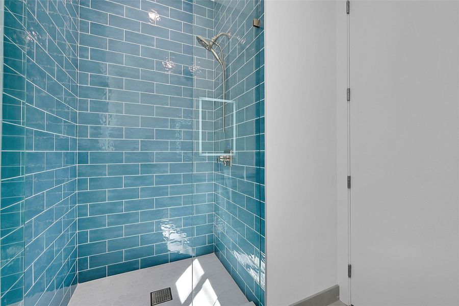 Step in shower on the first floor. located across from the office.