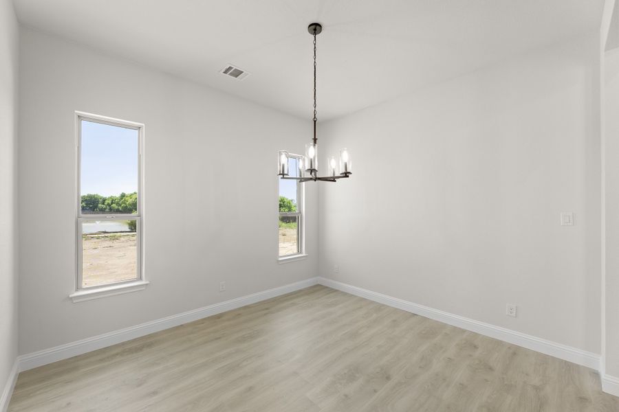 Representative unfurnished interior of a home built from the Cedarwood II by Sandlin Homes in Lakesong, Midlothian (Image 18).