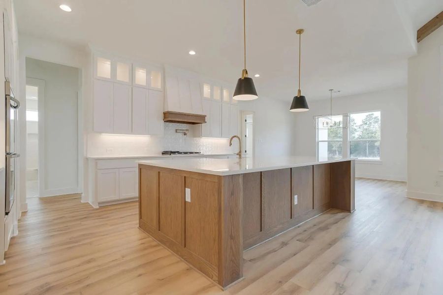 Representative furnished interior of a home built from the The Luke by Elmwood Custom Homes in Ranch at Stone Hill, Waxahachie (Image 28).