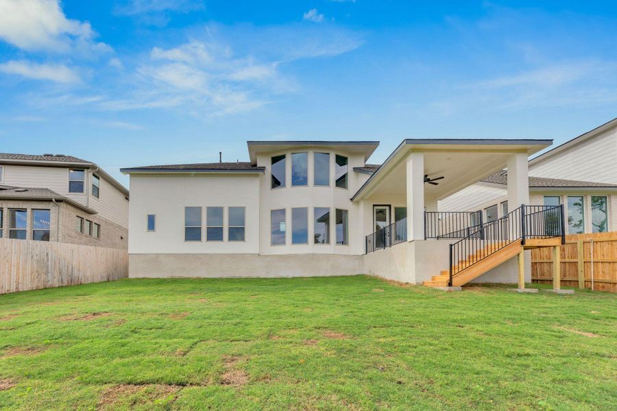 Exterior details and patio area of a home in Santa Rita Ranch - 60', Liberty Hill (Image 22). Exterior details and patio area of a home in Santa Rita Ranch - 60', Liberty Hill (Image 22).