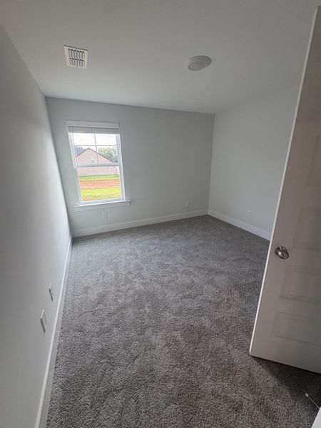 Spacious, unfurnished interior of a new home in Rookers Bend, Smyrna (Image 24).