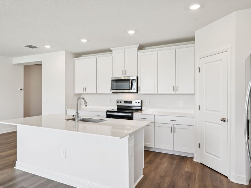 Furnished interior view inside a new home in The Reserve at Hammock Oaks - Signature Series, Lady Lake (Image 6).