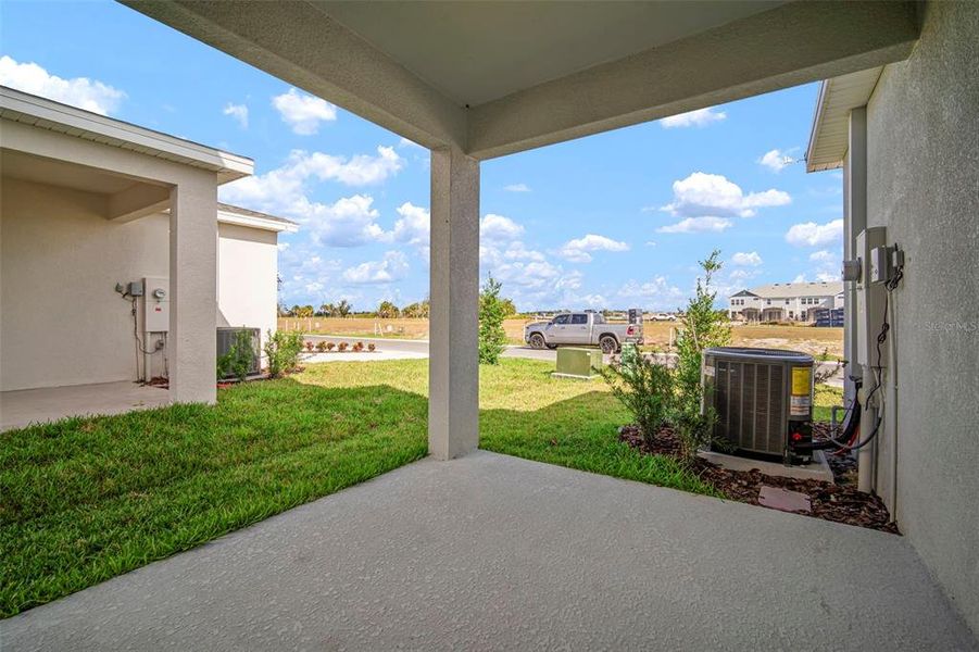 Exterior details and patio area of a home in North River Ranch, Parrish (Image 22).