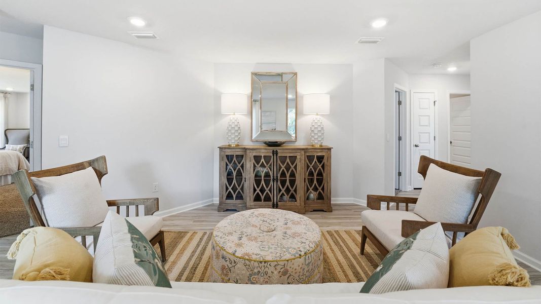 Furnished interior view inside a new home in Chateau Nemours, Port Saint Joe (Image 9).