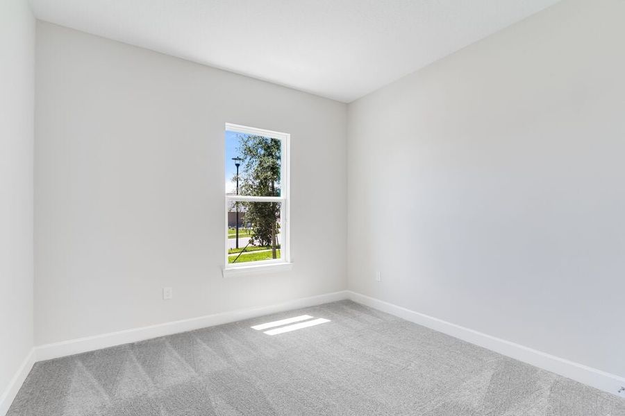 Representative unfurnished interior of a home built from the Letizia by Taylor Morrison in Esplanade at Center Lake Ranch, St. Cloud (Image 27).