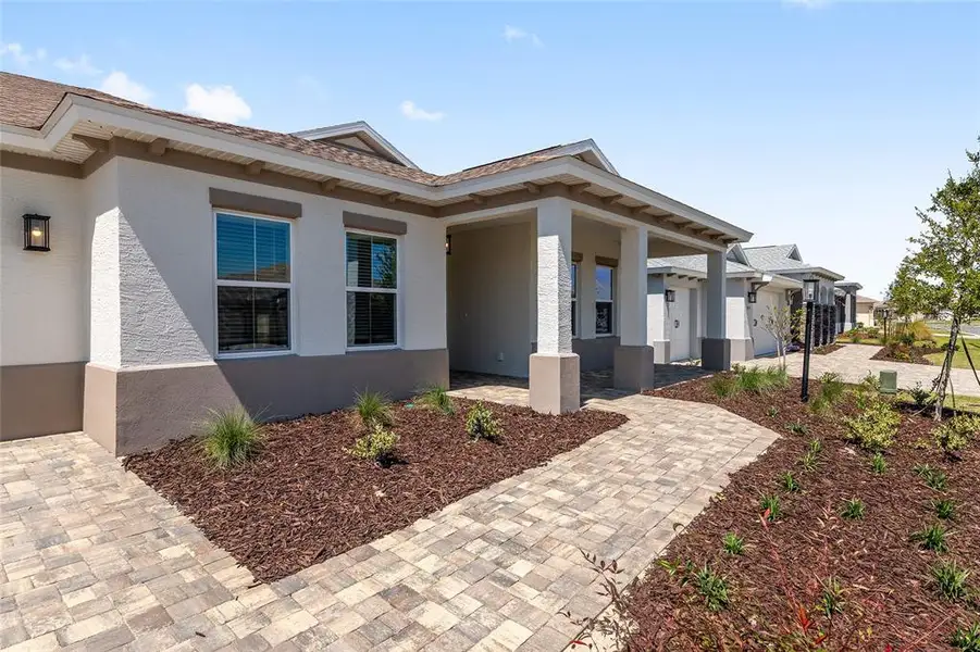Exterior details and patio area of a home in , Ocala (Image 4).