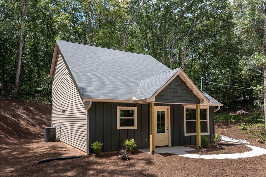 Front exterior of a new home in , Buchanan, GA, highlighting curb appeal (Image 13).