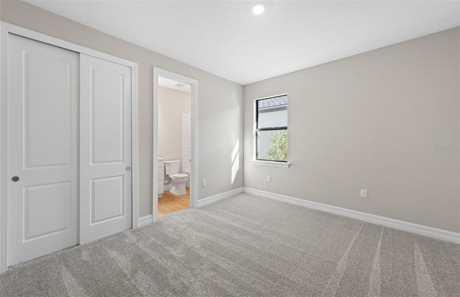 Spacious, unfurnished interior of a new home in The Strand at Cedar Grove, North Port (Image 17).
