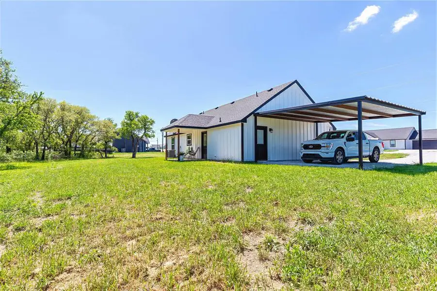 Exterior details and patio area of a home in , Azle (Image 3).