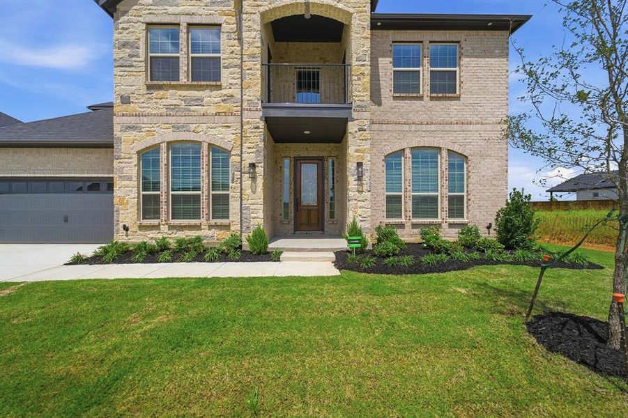 Stone and brick exterior with arched window details