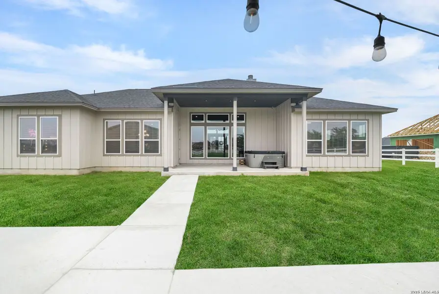 Exterior details and patio area of a home in Pradera Ridge, Floresville (Image 25).