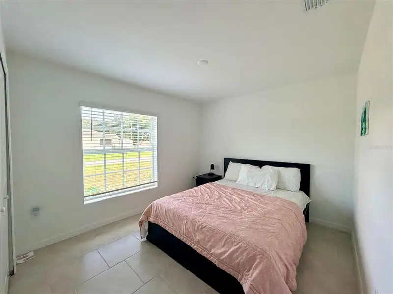 Furnished interior view inside a new home in , Port Charlotte (Image 11).