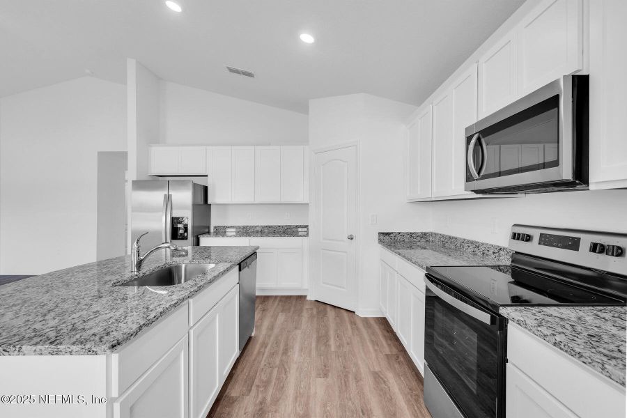 Furnished interior view inside a new home in , Green Cove Springs (Image 10).