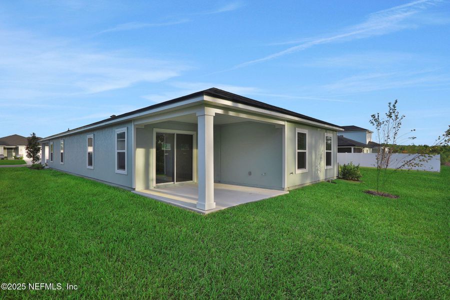 Exterior details and patio area of a home in Cordova Palms, St. Augustine (Image 20). Exterior details and patio area of a home in Cordova Palms, St. Augustine (Image 20).