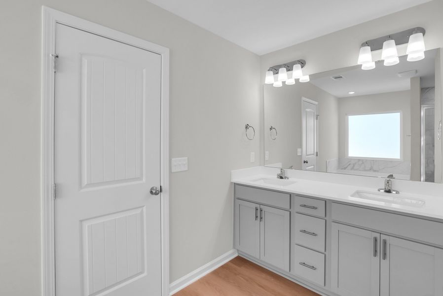 Representative furnished interior of a home built from the The Aspen by Smith Family Homes in Sweetwater, Brunswick (Image 9).