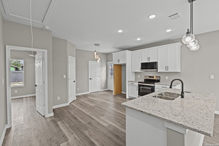 Furnished interior view inside a new home in , San Antonio (Image 12).