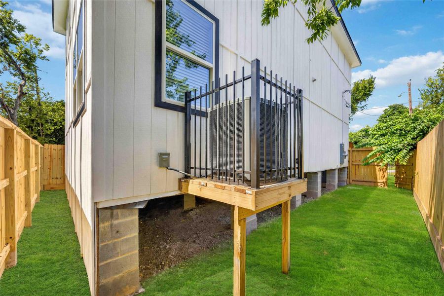 Exterior details and patio area of a home in , Houston (Image 3).