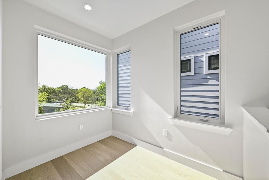 3rd Floor Bright Loft/flex Space (This is Unit #2 - each Unit has the same layout, however a few differing details such as light fixtures, custom cabinet/backsplash/tile colors)